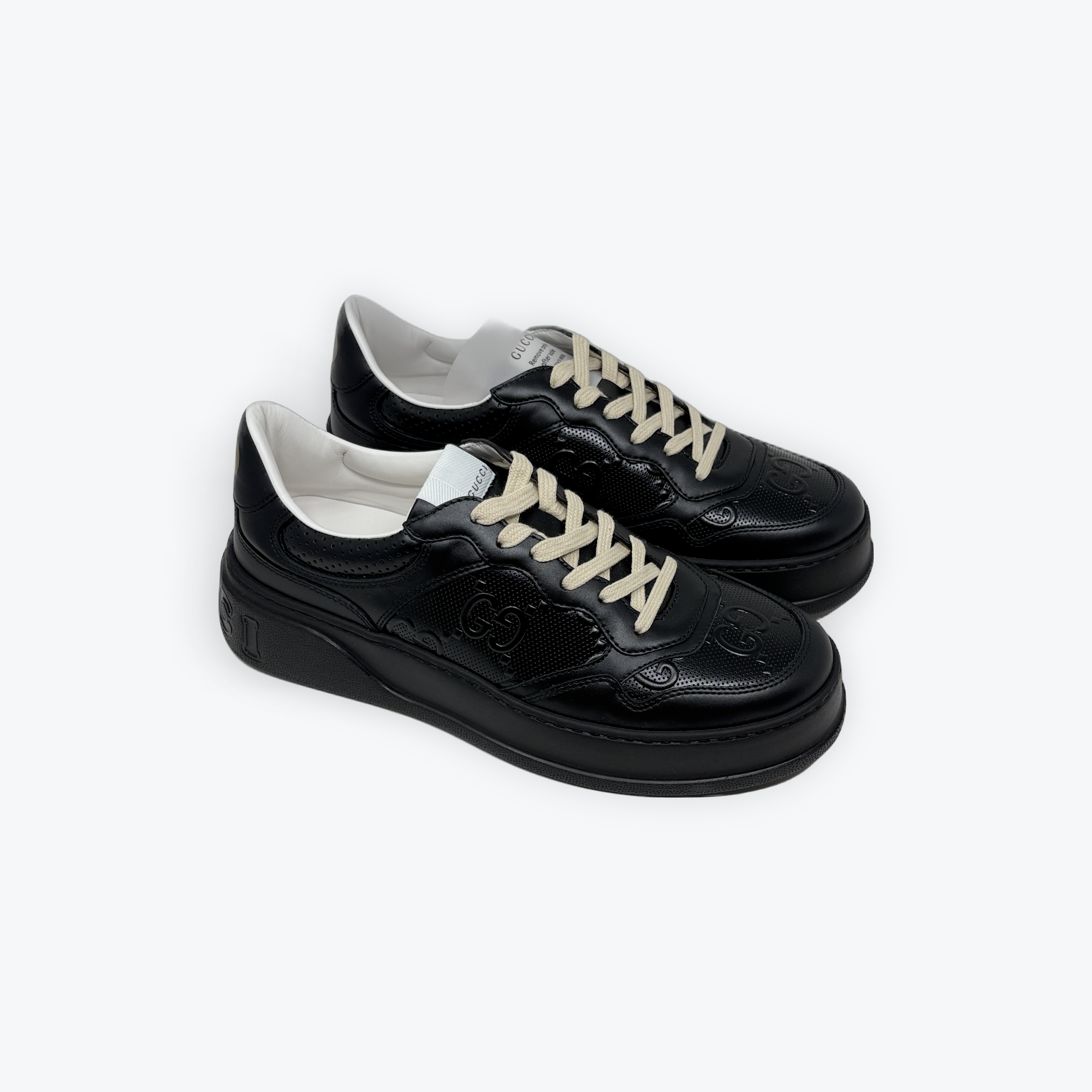 GG Embossed Leather Trainers